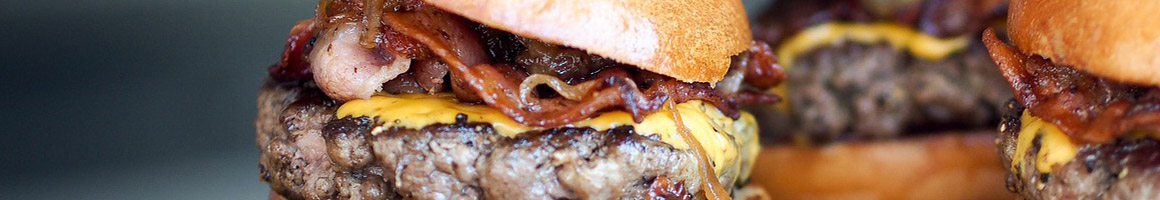 Eating Burger at Brenda's Frozen Custard restaurant in Sandwich, IL.
